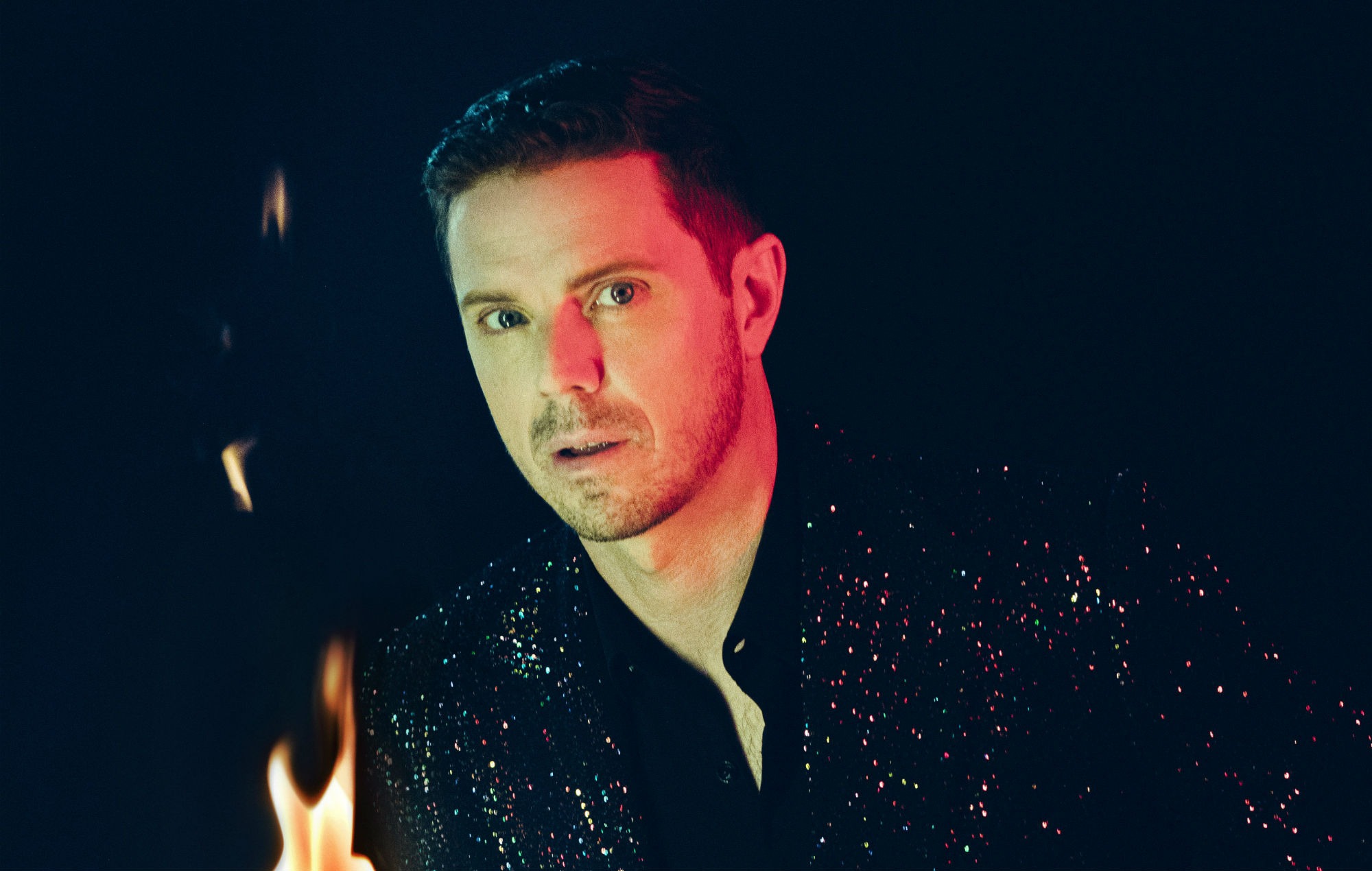 “I’m going to send it to Kylie for a laugh”: Jake Shears talks appearing in Neighbours, “sinister” new music and possible Scissor Sisters reunion