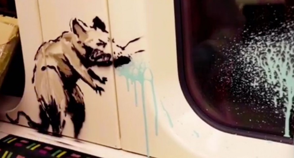 Banksy artwork on London Underground encourages mask-wearing