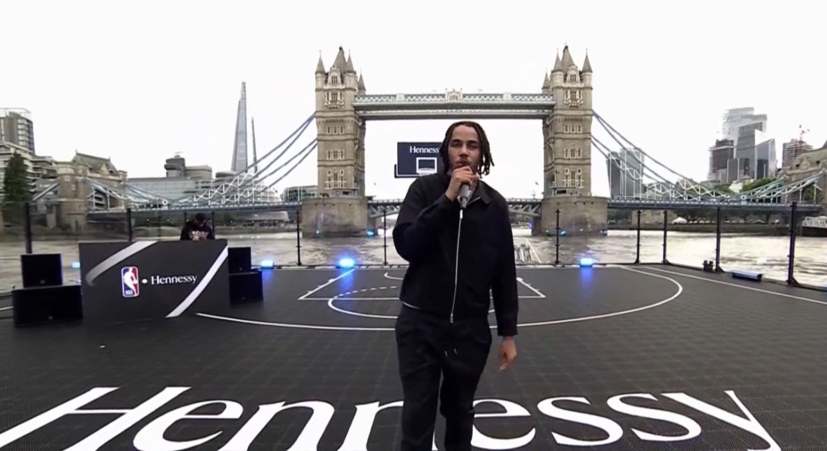 Watch AJ Tracey perform on floating basketball court on the Thames