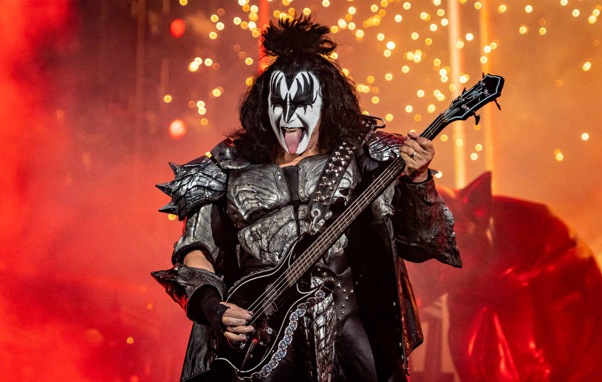 KISS pause Brazil show after Gene Simmons falls ill and performs sat down