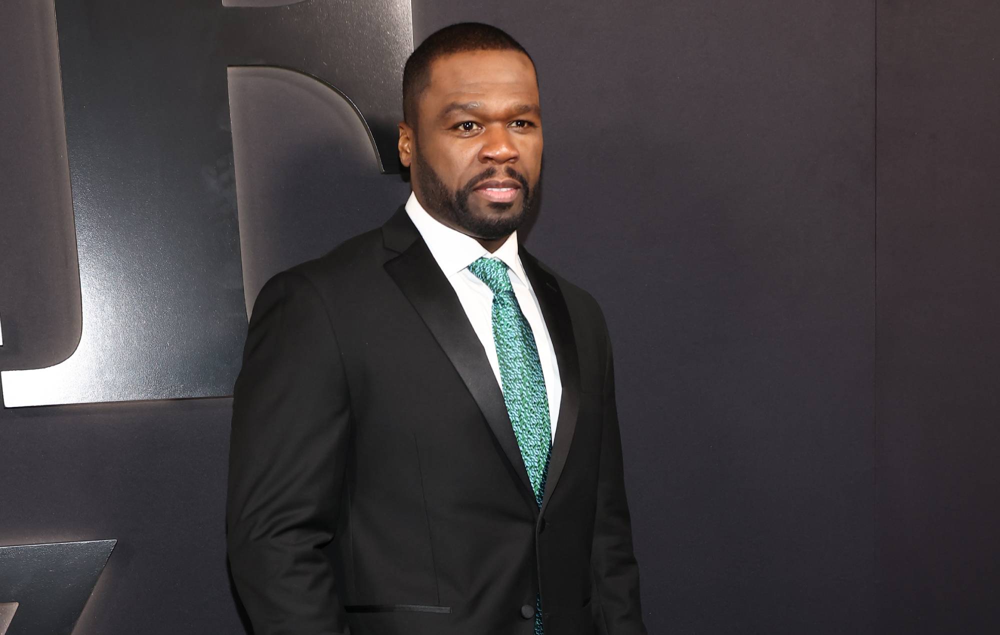 50 Cent complains about appearance on ‘The Expendables 4’ poster: “Did we run out of money?”