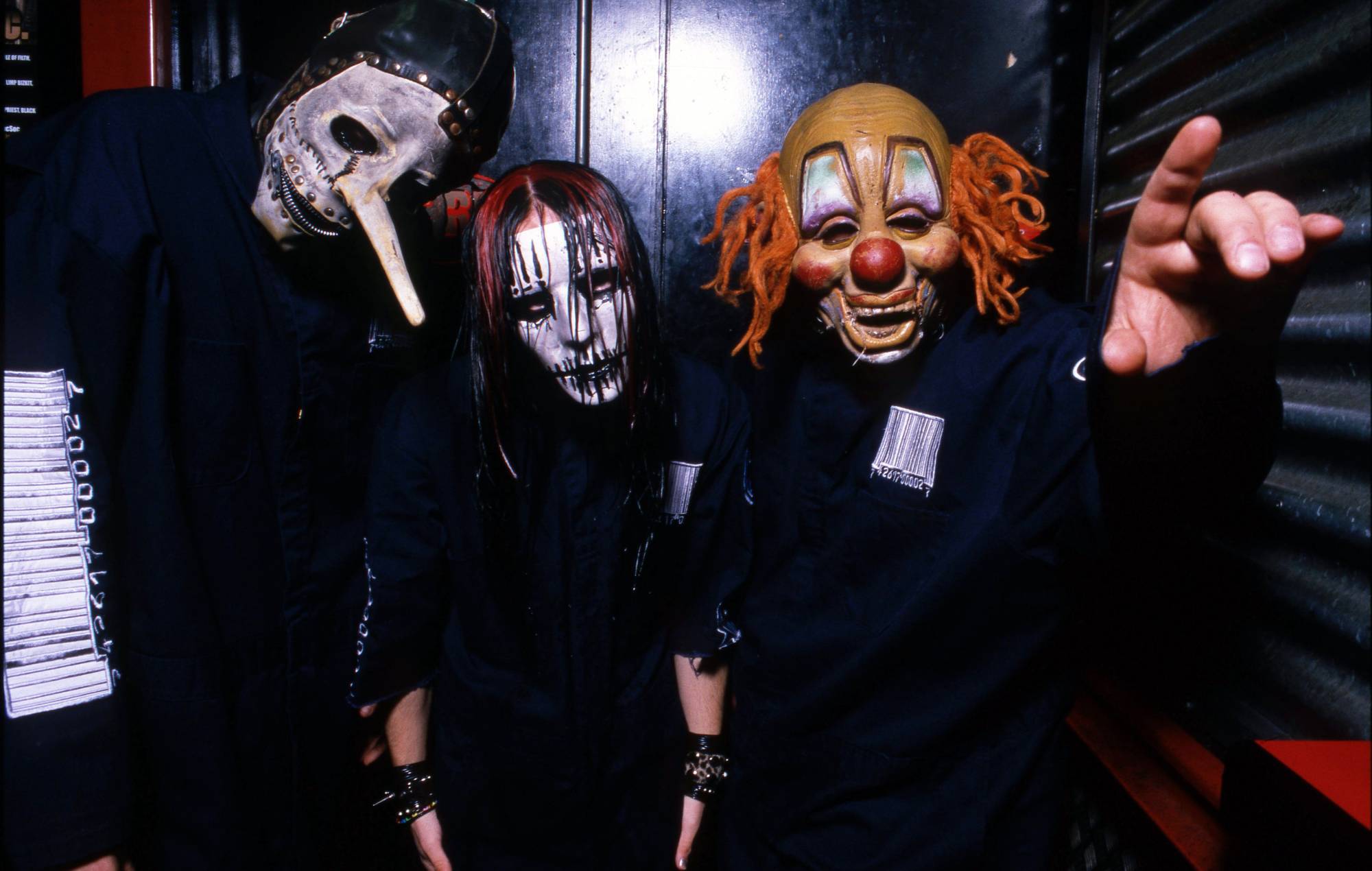 Slipknot, backstage at Brixton Academy, London, United Kingdom, 5th March 2000. L-R Chris Fehn, Joey Jordison, Shawn Crahan. (Photo by Martyn Goodacre/Getty Images)